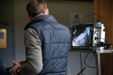 Veterinary & Agriculture Photography - Showing the veterinary surgeon, looking at the inside of the horses stomach, looking at Ulcers 